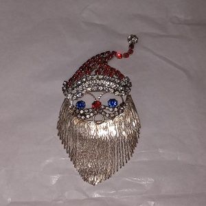 Adorable blue eyed Santa face pin